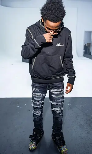 TaTa wearing Amiri hoody