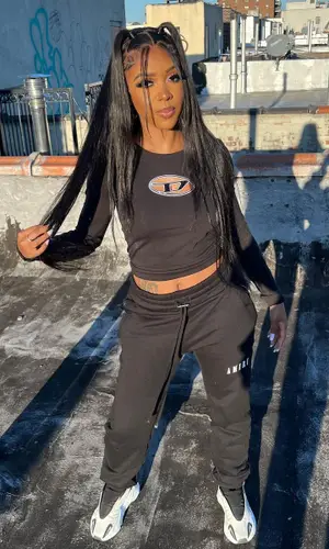 Shani Boni wearing Adidas sneakers