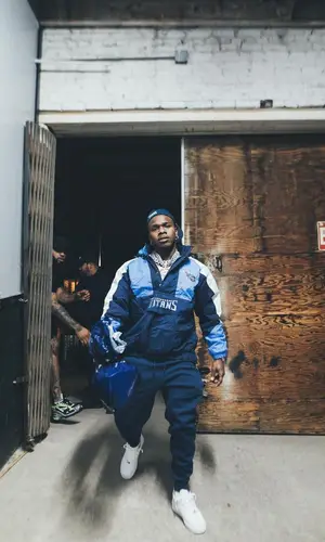 DaBaby wearing Tennessee Titans jacket
