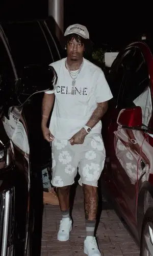 21 Savage wearing Celine t-shirt
