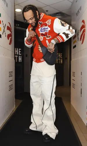Gary Trent J.R wearing Gucci boots