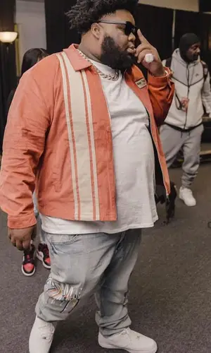 Rod Wave wearing Homme + Femme jacket