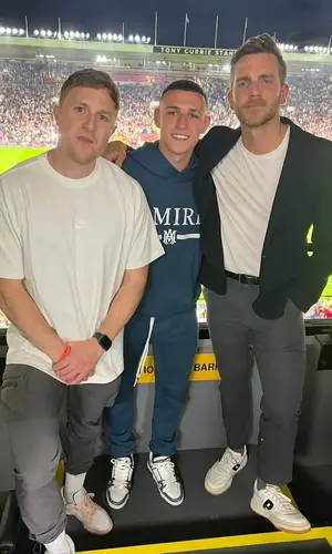 Phil Foden wearing Louis Vuitton sneakers