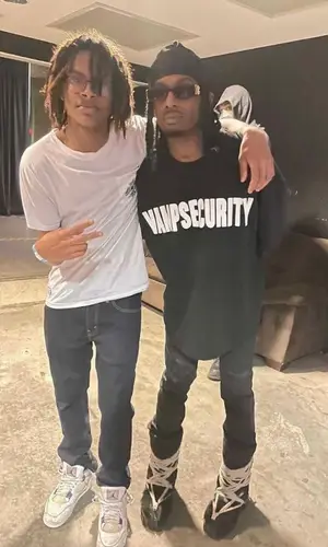 Playboi Carti wearing Rick Owens boots
