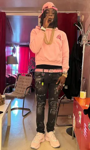 Gazo wearing Gucci cap