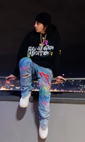 Tedua wearing Off-White jeans