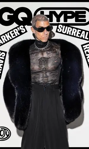 Travis Barker wearing Yves Saint Laurent jacket