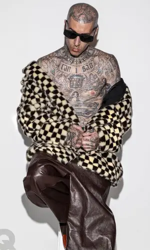 Travis Barker wearing Amiri jacket