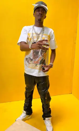 King Combs wearing New Era cap