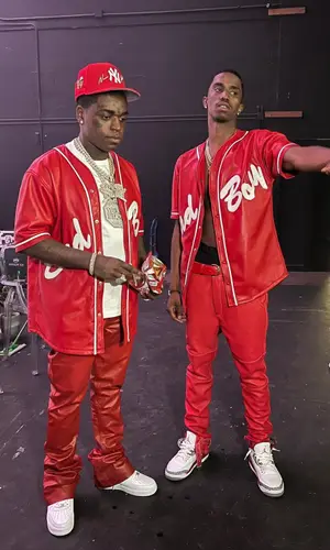 Kodak Black wearing Demoworld cap
