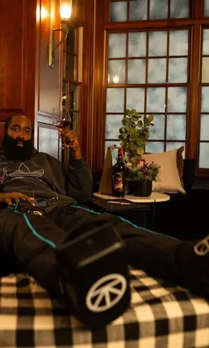 James Harden wearing Therabody boots