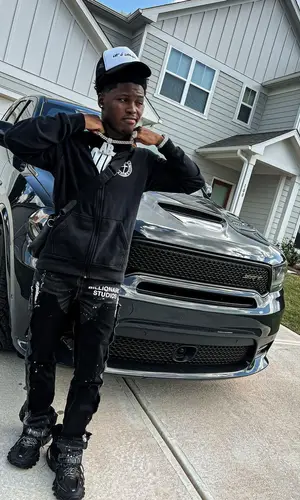 AveryB wearing Balenciaga sneakers