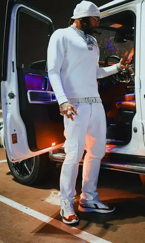 Money Man wearing Prada sneakers