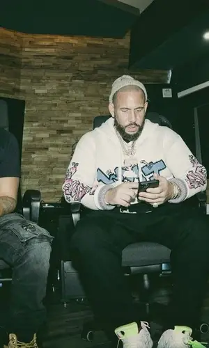 DJ Drama wearing Off-White hoody