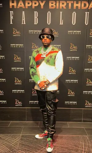 Fabolous wearing Denim Tears sweater