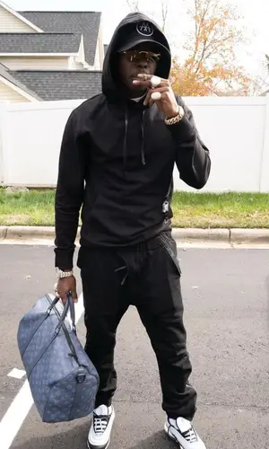 Bobby Shmurda wearing Cartier eyewear