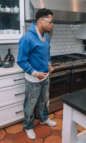 Devin Haney wearing Louis Vuitton bag