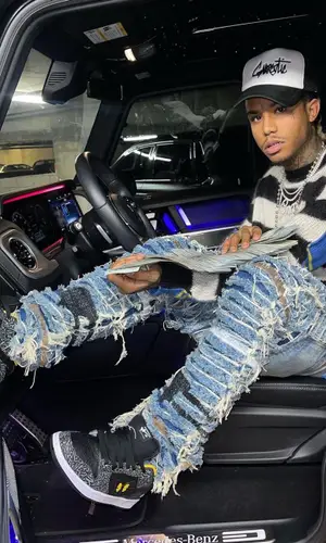 Lil Gnar wearing Gnarcotic cap