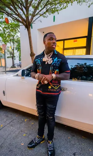 BandMan Kevo wearing Amiri shirt