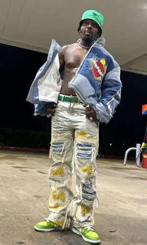Sauce Walka wearing Prada belt