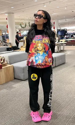 Coi Leray wearing Louis Vuitton eyewear