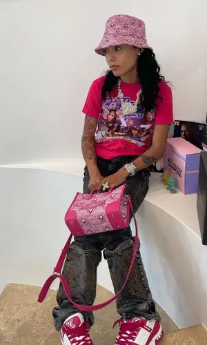 Coi Leray wearing Louis Vuitton sneakers