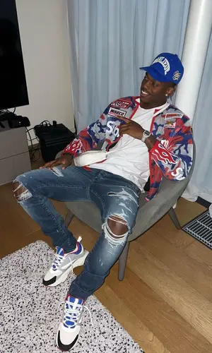 Rafael Leao wearing Goyard bag
