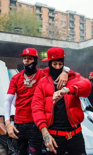 Sfera Ebbasta’s Outfit in Prada Jacket, Louis Vuitton Belt & New Era Cap (2022)