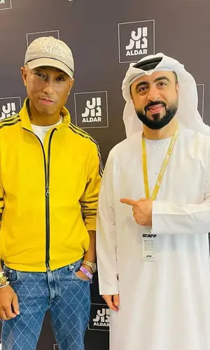 Pharrell Williams wearing Adidas jacket
