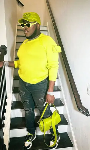 Saucy Santana wearing Fendi cap