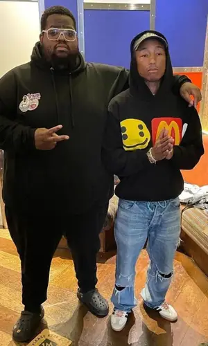 Pharrell Williams wearing Cactus Plant Flea Market hoody