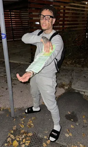 MamboLosco wearing Nike pants