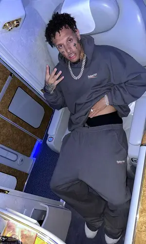 MamboLosco wearing Balenciaga hoody