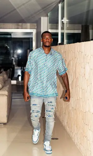 Callum Hudson-Odoi wearing Amiri jeans