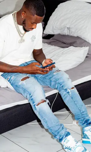 Callum Hudson-Odoi wearing Amiri jeans