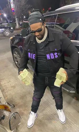 Peezy wearing Versace eyewear