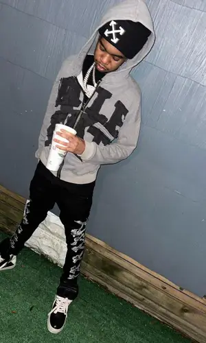 Lil Poppa wearing Vale Forever hoody