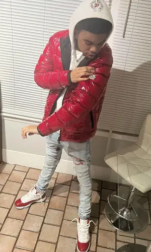 Lil Poppa’s Outfit in Moncler Jacket, Chrome Hearts Hoodie & Amiri Jeans (2022)
