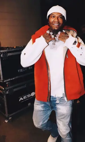 Moneybagg Yo wearing Heron Preston sweater