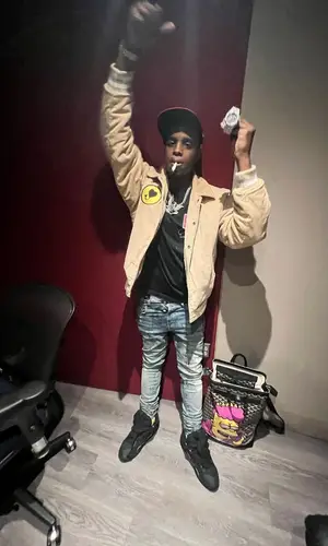 Lil Double 0 wearing Amiri jeans