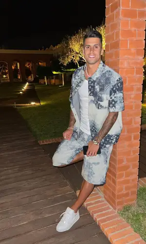 Joao Cancelo wearing Louis Vuitton sneakers