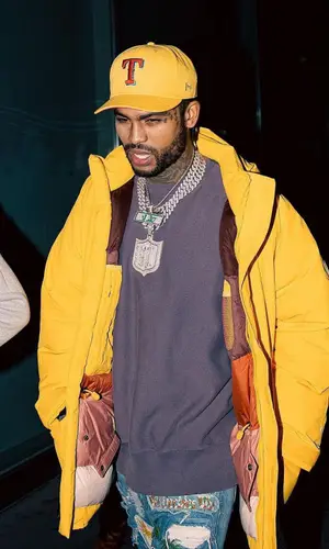 Dave East wearing Kith jacket