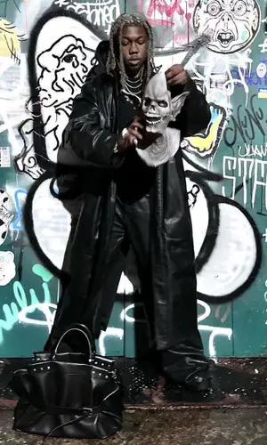 Destroy Lonely wearing Balenciaga bag