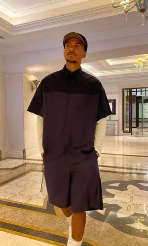 Dele Alli wearing Prada shirt
