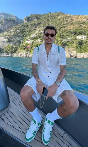 Dele Alli wearing Chanel bag