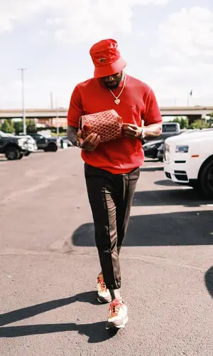 Kareem Jackson wearing Prada hat