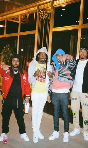 G Herbo wearing ERL sweater