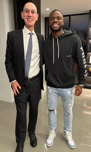 Frances Tiafoe wearing Purple Brand jeans