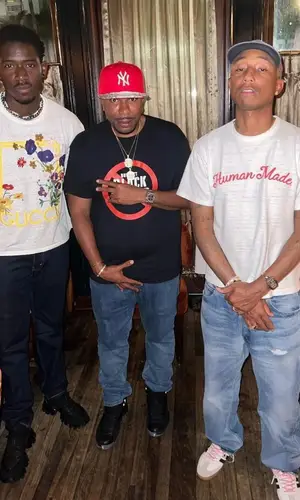 Pharrell Williams wearing Celine jeans