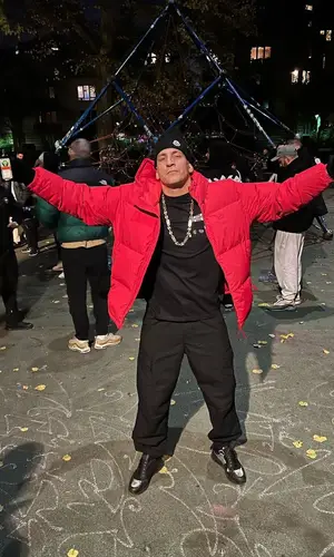 Gzuz wearing Lacoste jacket